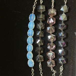Resin stone necklaces with silver rhodium chains. necklaces sold individually.